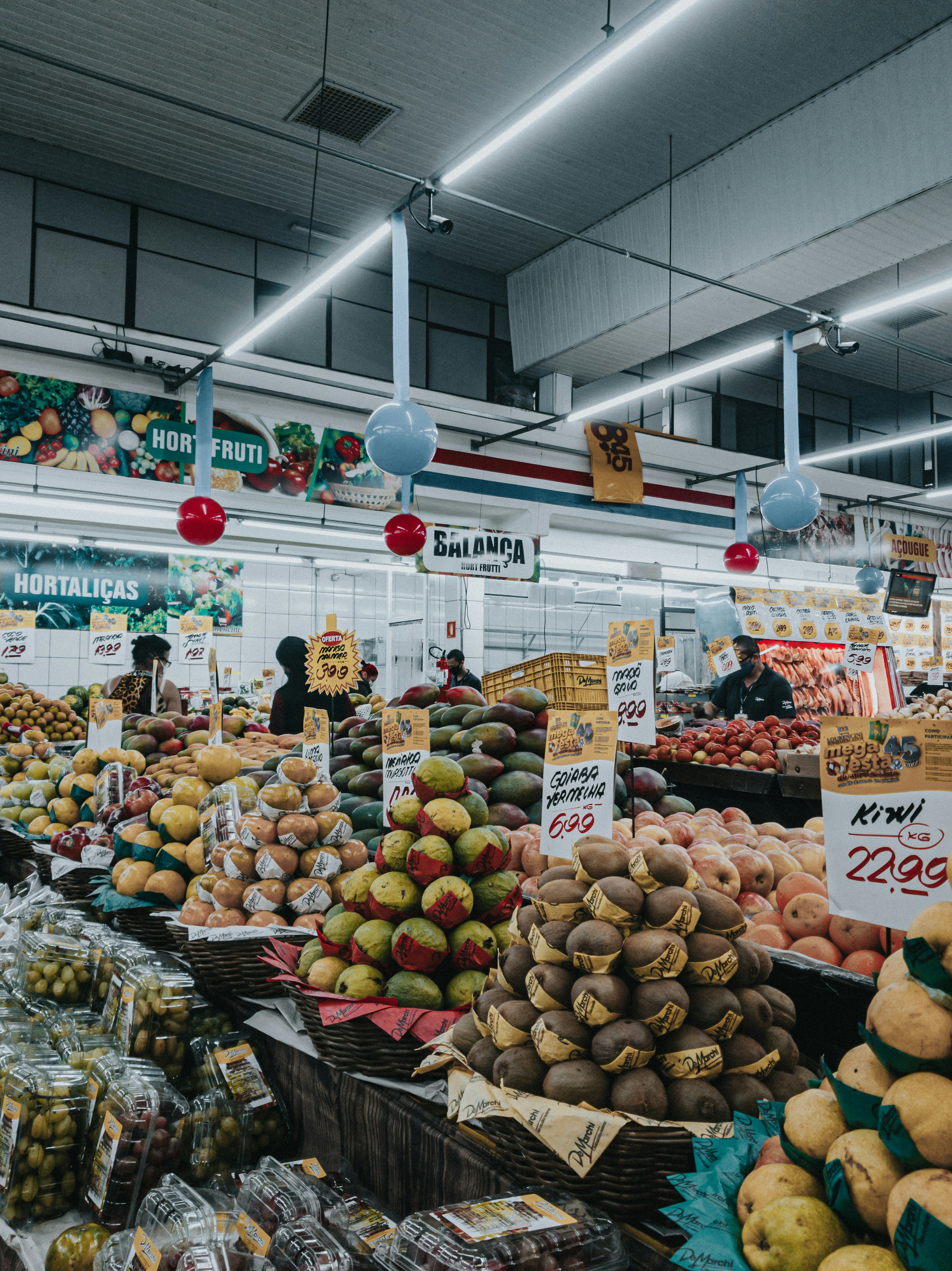 fruit display in market during daytime